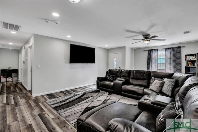 living room with ceiling fan and wood-type flooring