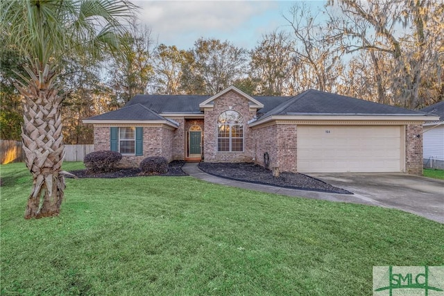 single story home with a front yard and a garage