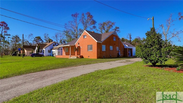 view of property exterior with a yard