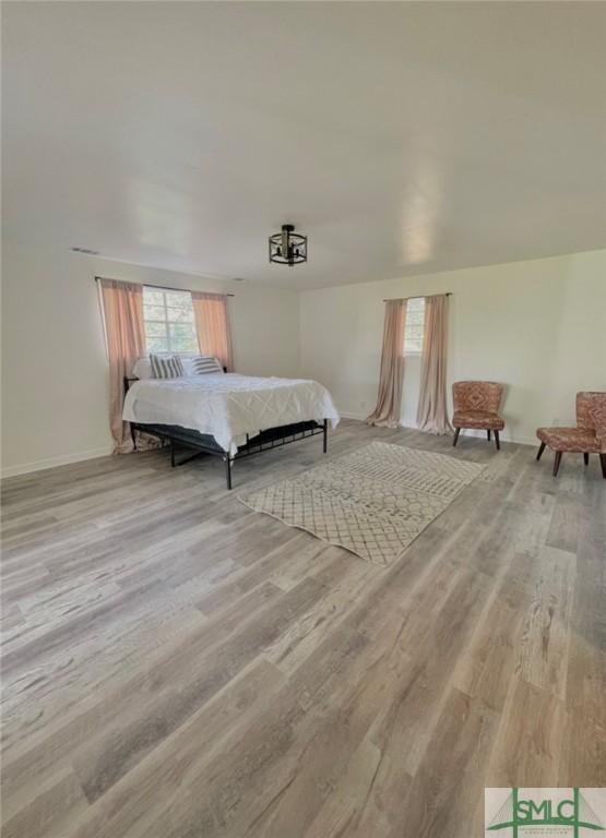 bedroom featuring light hardwood / wood-style floors