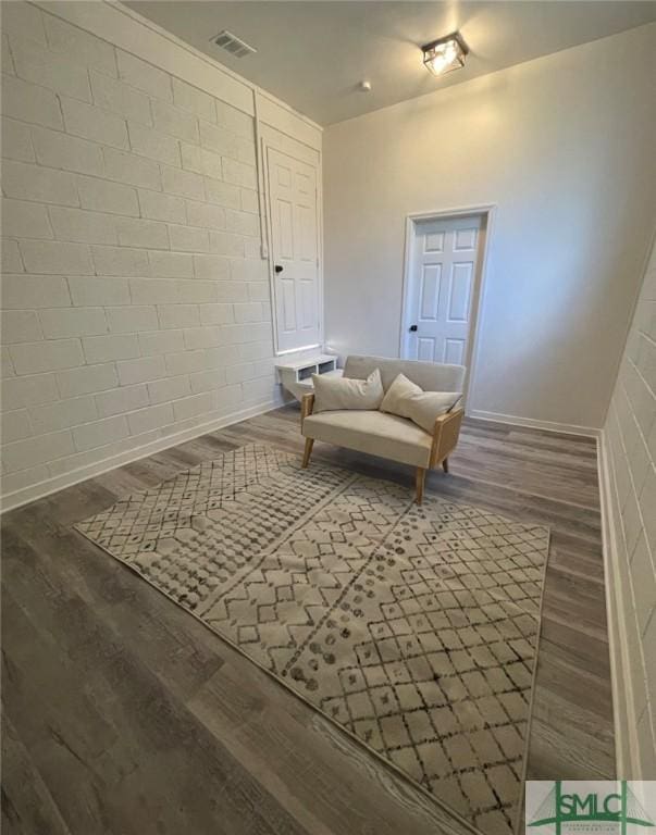 living area with dark hardwood / wood-style flooring