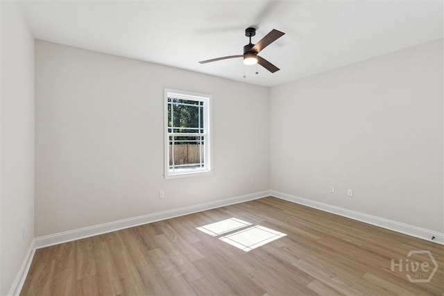 130 N Skinner Ave, Pooler, GA 31322 - spare room featuring light wood-style floors, baseboards, and a ceiling fan