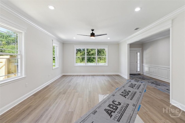 130 N Skinner Ave, Pooler, GA 31322 - unfurnished living room with healthy amount of natural light, a ceiling fan, wood finished floors, crown molding, and recessed lighting