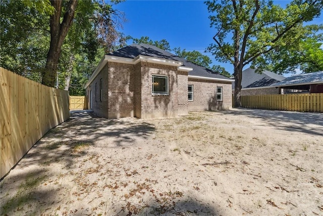 130 N Skinner Ave, Pooler, GA 31322 - back of property with brick siding and a fenced backyard
