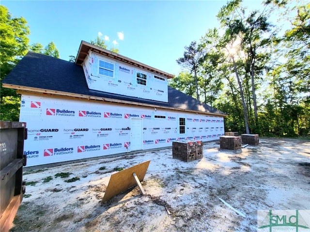 view of home's exterior with central AC