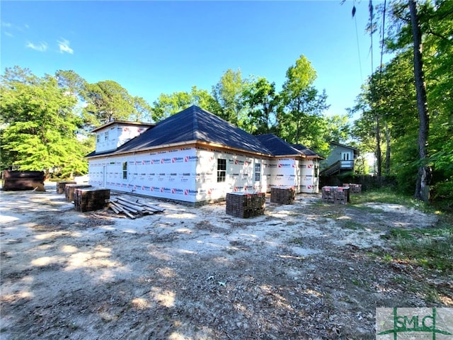 view of property exterior with central AC unit
