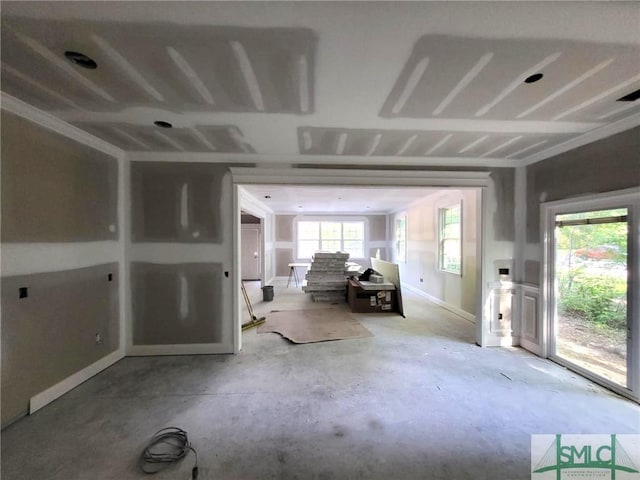 empty room with baseboards