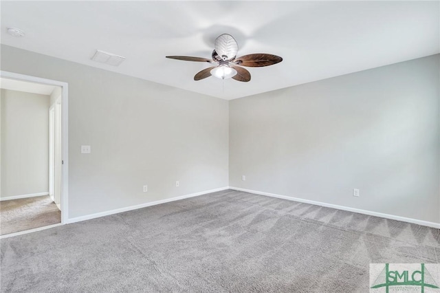 unfurnished room featuring carpet floors and ceiling fan