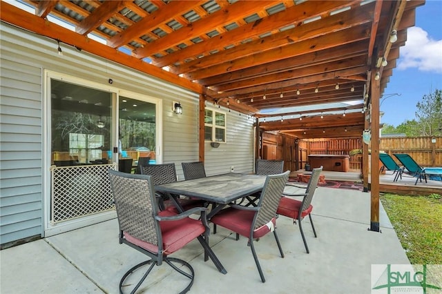 view of patio featuring a jacuzzi