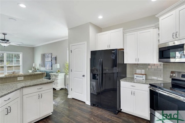 kitchen featuring ceiling fan, white cabinets, and stainless steel appliances