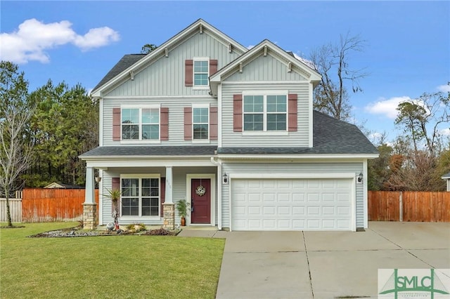 craftsman house featuring a front yard and a garage