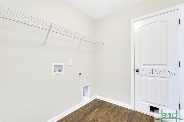 washroom featuring hookup for an electric dryer, dark hardwood / wood-style flooring, and washer hookup