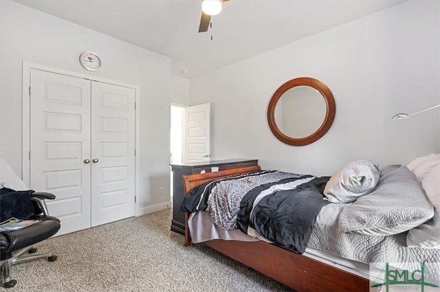 bedroom featuring ceiling fan, a closet, and carpet floors