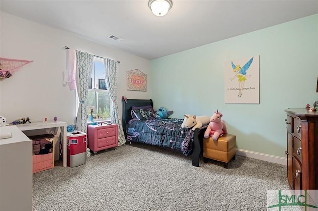 bedroom with light carpet