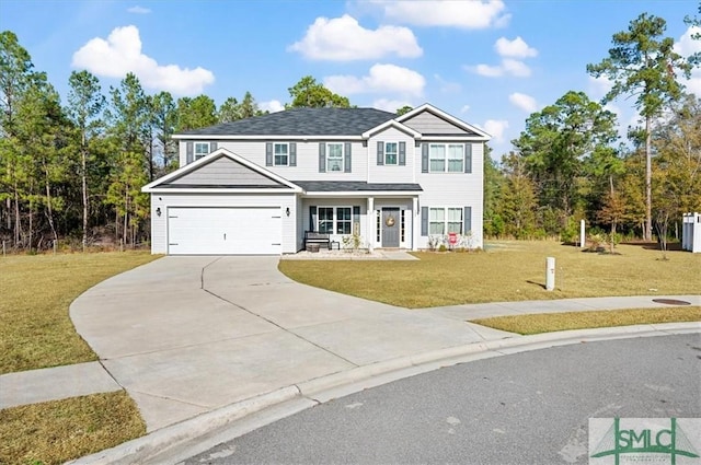 view of front of property featuring a front yard, a porch, and a garage