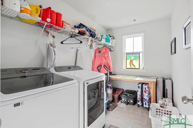 laundry area featuring washer and clothes dryer