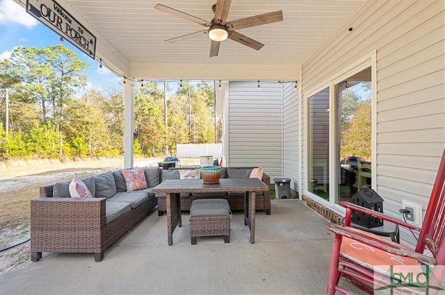 view of patio / terrace with an outdoor living space and ceiling fan