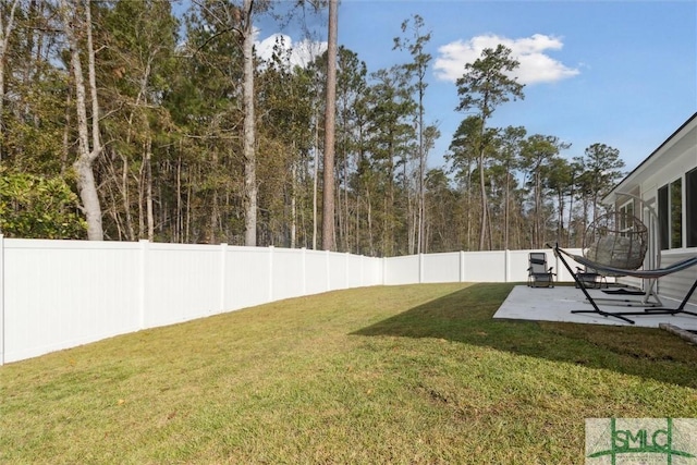 view of yard featuring a patio