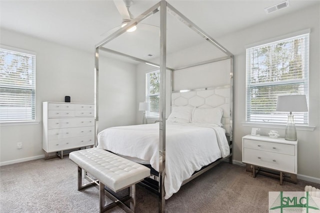 carpeted bedroom with ceiling fan