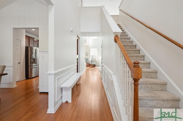 staircase featuring hardwood / wood-style floors