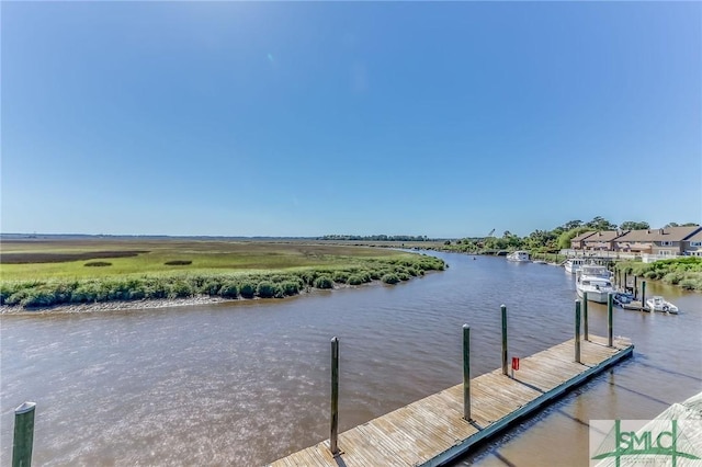 dock area featuring a water view