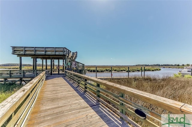 dock area featuring a water view