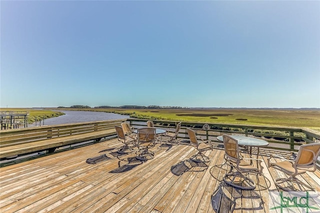 wooden terrace with a rural view