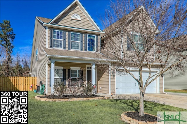 view of front property featuring a front lawn and a garage