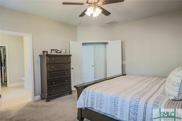 carpeted bedroom featuring ceiling fan