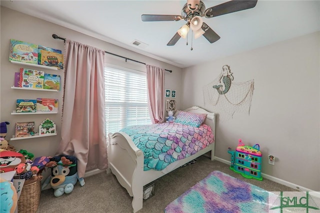 carpeted bedroom with ceiling fan