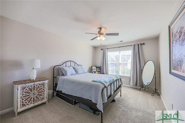 carpeted bedroom featuring ceiling fan