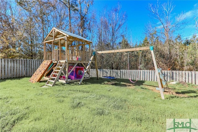 view of jungle gym with a yard