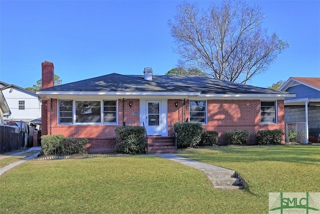 ranch-style house with a front yard