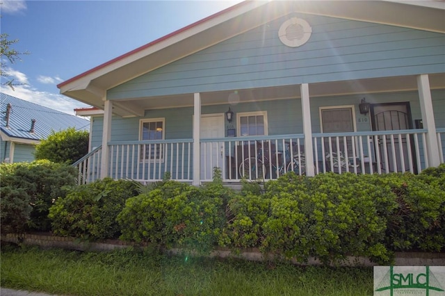 exterior space featuring covered porch