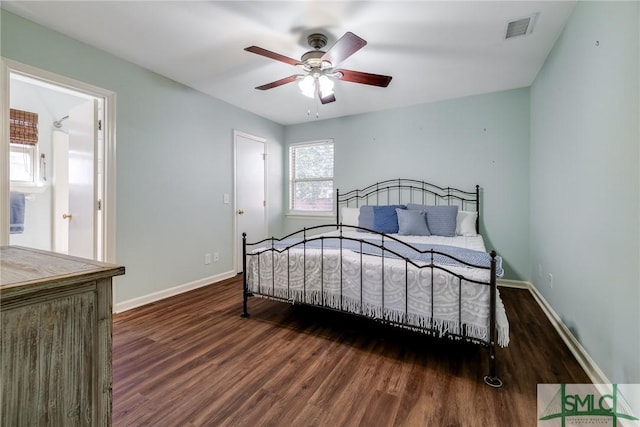 bedroom featuring ceiling fan and dark wood-type flooring