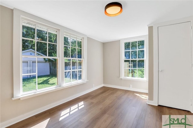 unfurnished room featuring light hardwood / wood-style floors