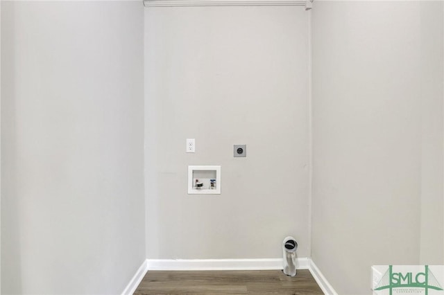 clothes washing area featuring hookup for a washing machine, hardwood / wood-style flooring, and electric dryer hookup