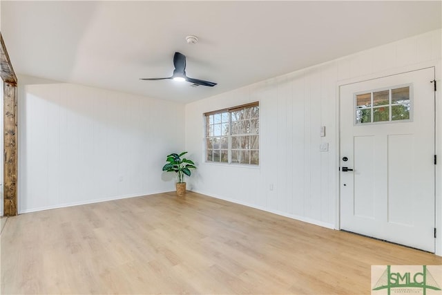 foyer featuring light hardwood / wood-style flooring and ceiling fan