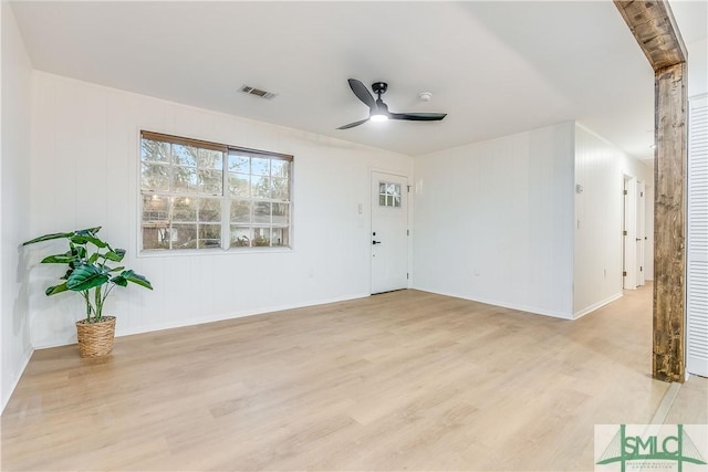 unfurnished room with ceiling fan and light hardwood / wood-style flooring