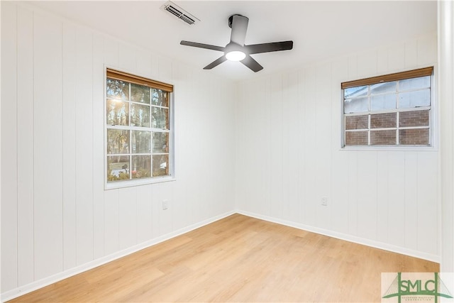 unfurnished room featuring wood-type flooring and ceiling fan