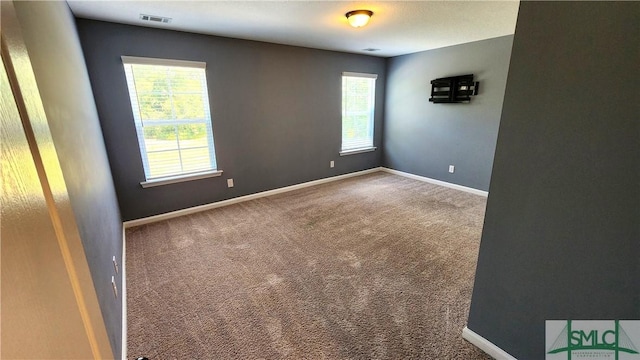 view of carpeted spare room