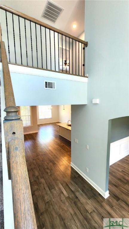 staircase featuring hardwood / wood-style floors