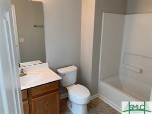 full bathroom featuring vanity, toilet, and bathing tub / shower combination