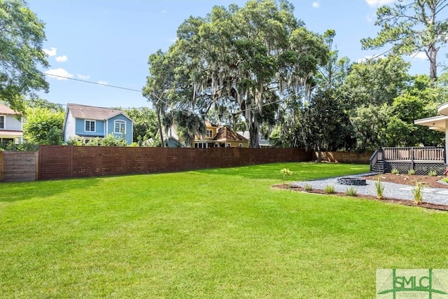 view of yard featuring a deck