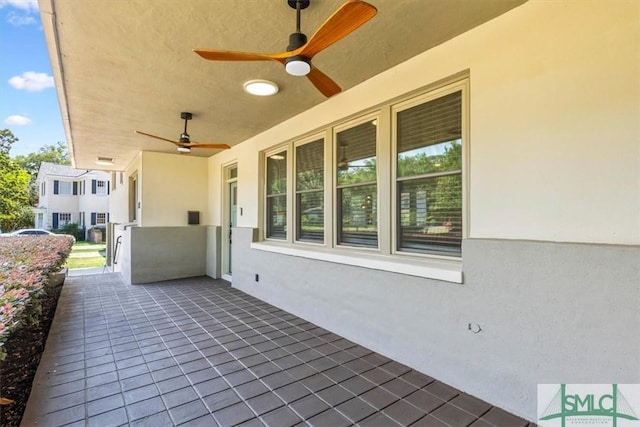 view of patio / terrace with ceiling fan