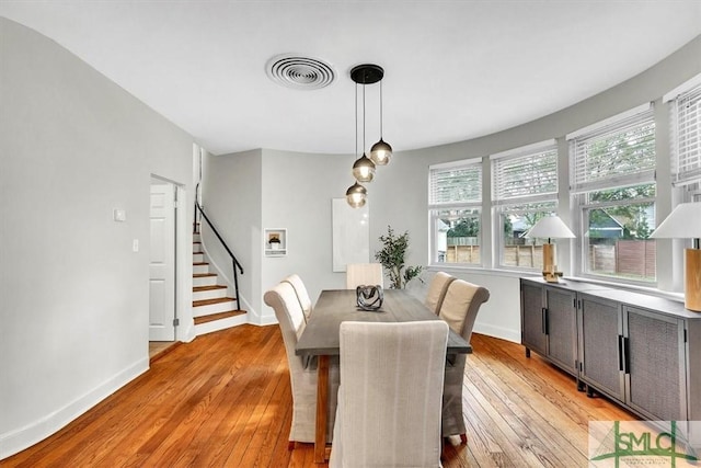 dining area with a healthy amount of sunlight and light wood-type flooring