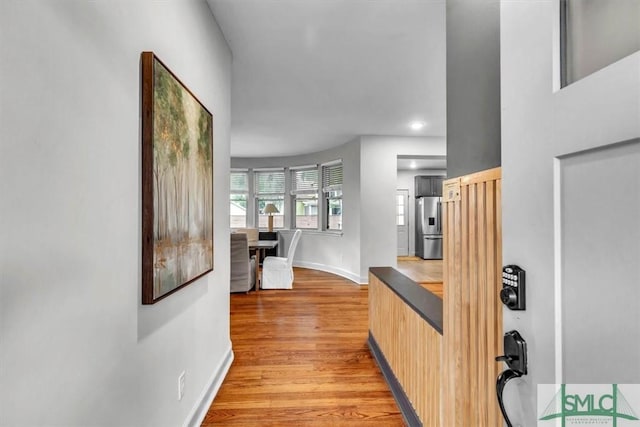 corridor featuring light wood-type flooring