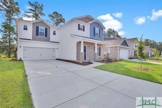 view of front facade with a front yard and a garage