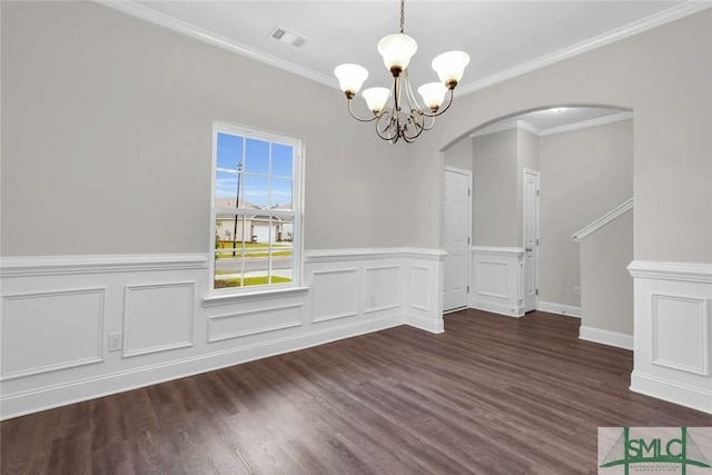 unfurnished dining area featuring a notable chandelier, dark hardwood / wood-style floors, and ornamental molding