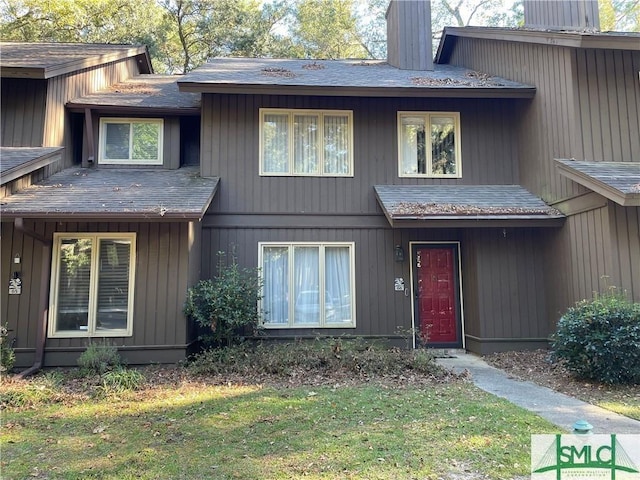 exterior space featuring a front yard